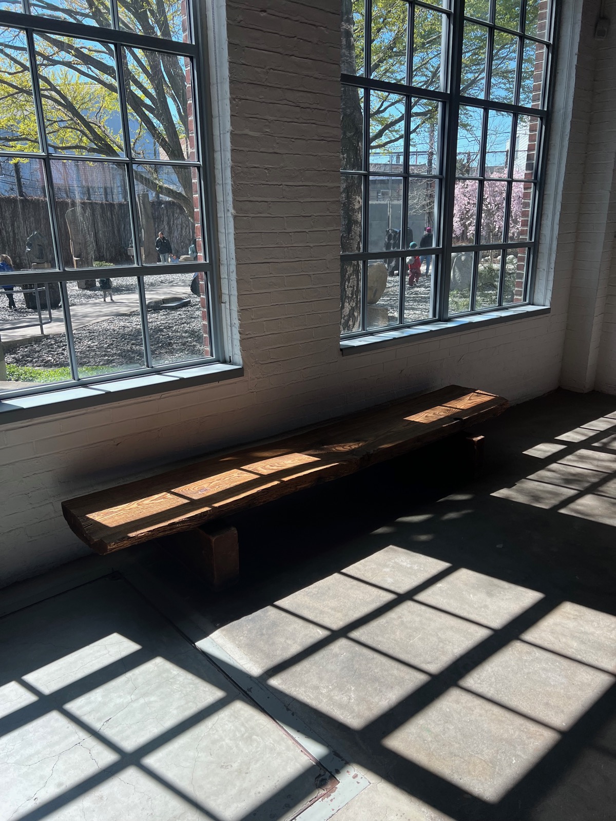 Bench in the studio with a view of sculptures
