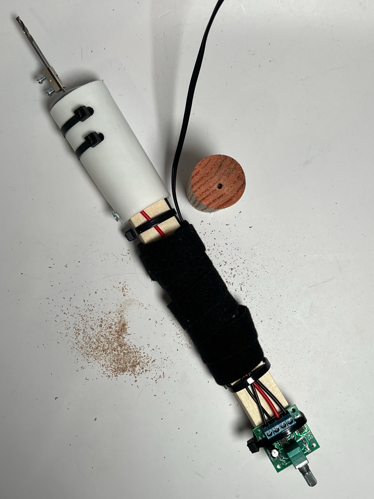 Improvised drill built from preselected parts during the Design for Survival workshop