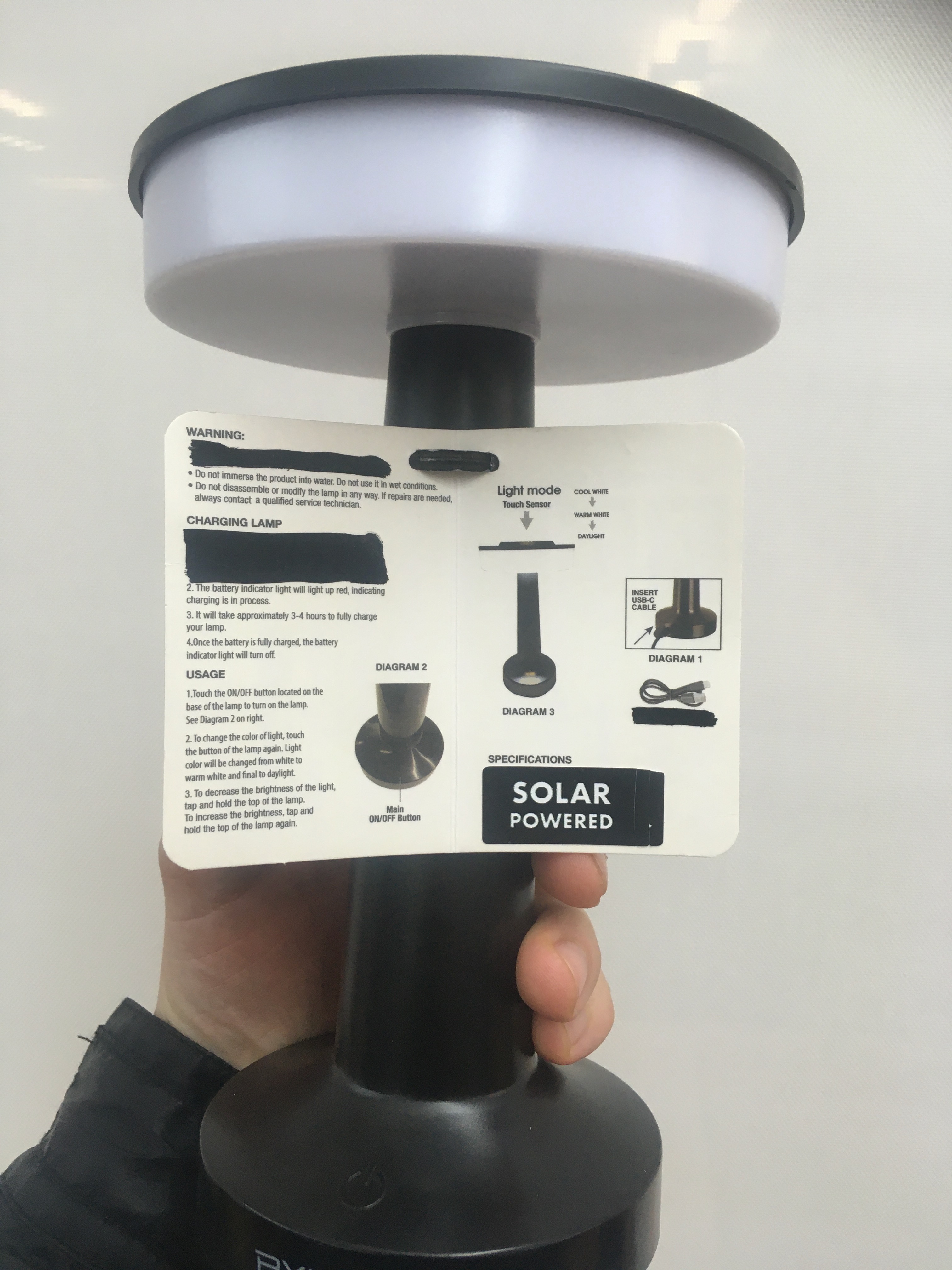 Solar powered lamp prototype - detail of informational card