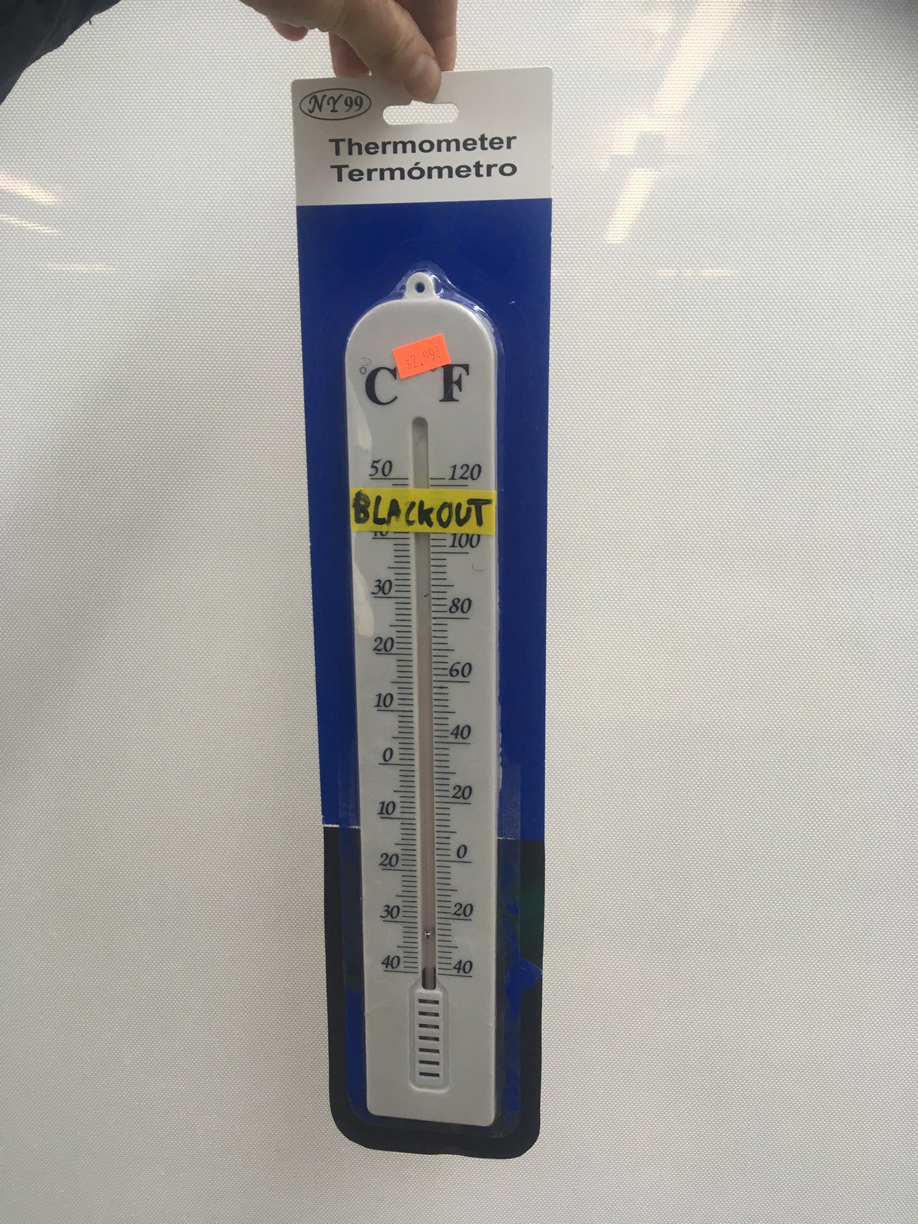 Modified thermometer with yellow tape at 105 degrees as a data-driven energy conservation device