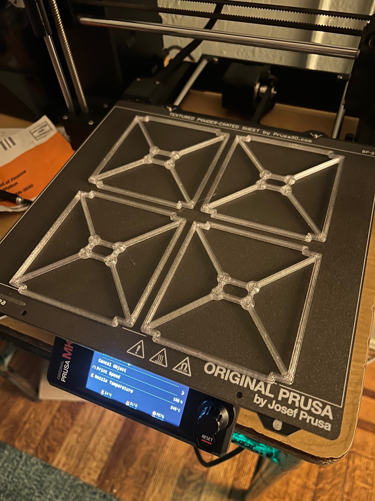 Four 3D-printed cube frame panels on an Original Prusa printer bed