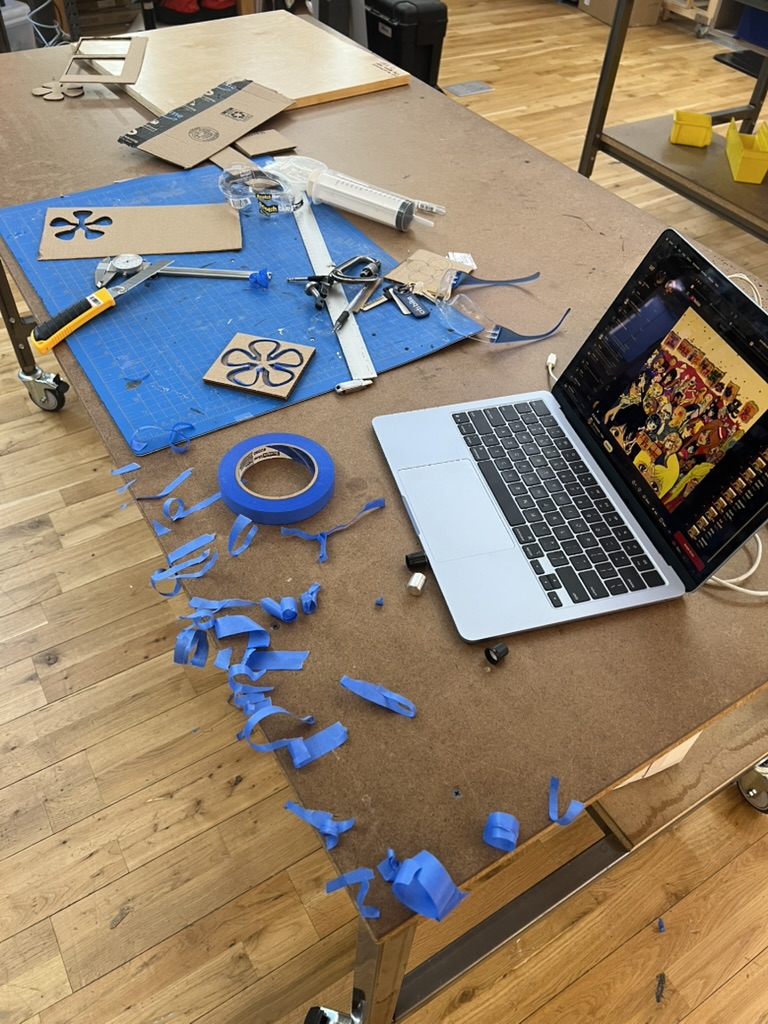 The cardboard mold covered in tape
