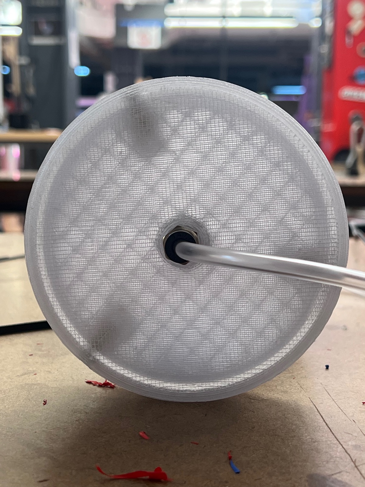 Close-up of the 3D printed end cap with air line passing through