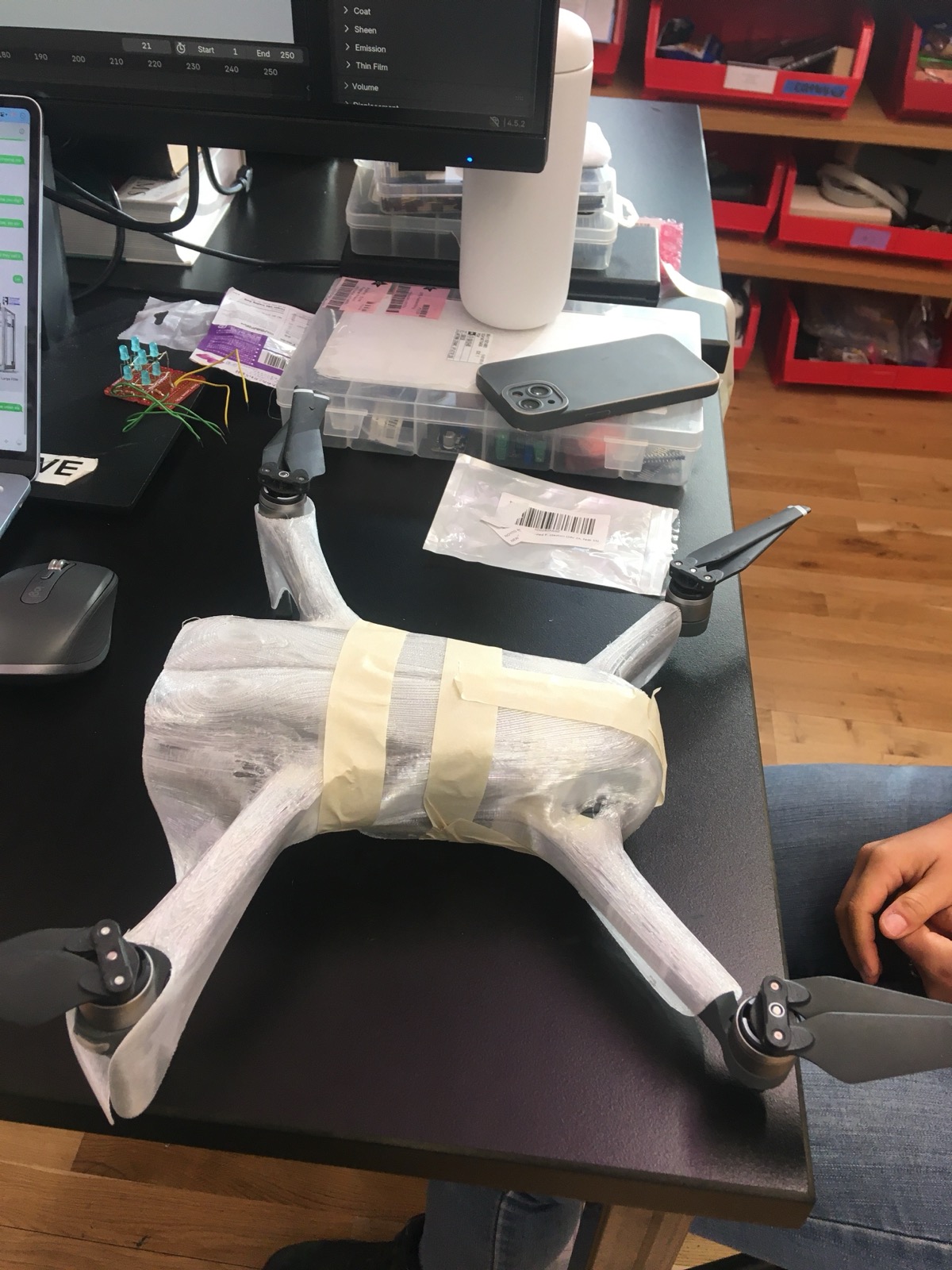 Drone assembly with shell fitted onto frame
